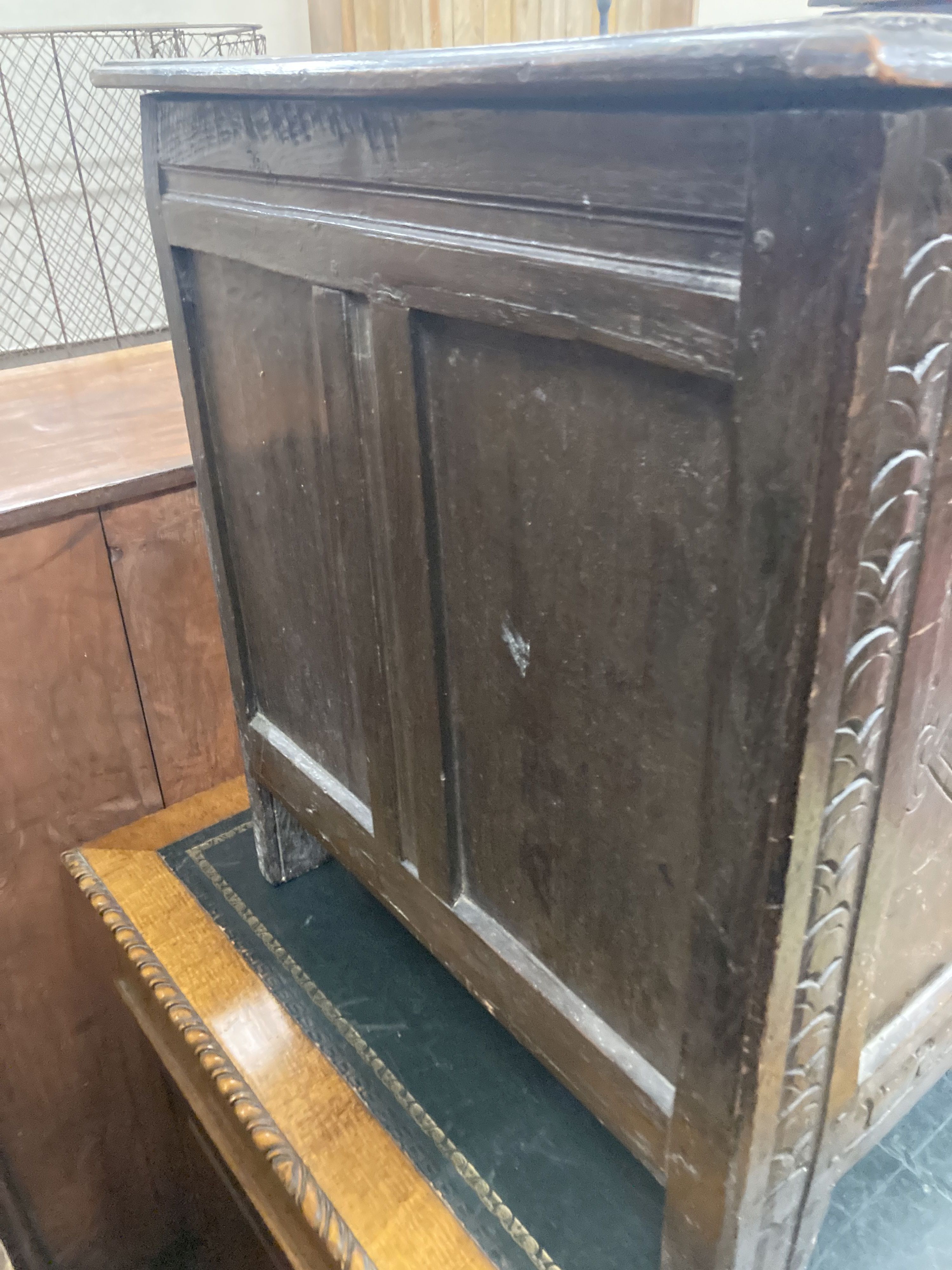 An early 18th century panelled oak coffer, length 134cm, depth 54cm, height 63cm